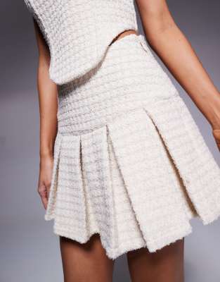 WANDERDOLL NOEL BOUCLE PLEATED MINI SKIRT 