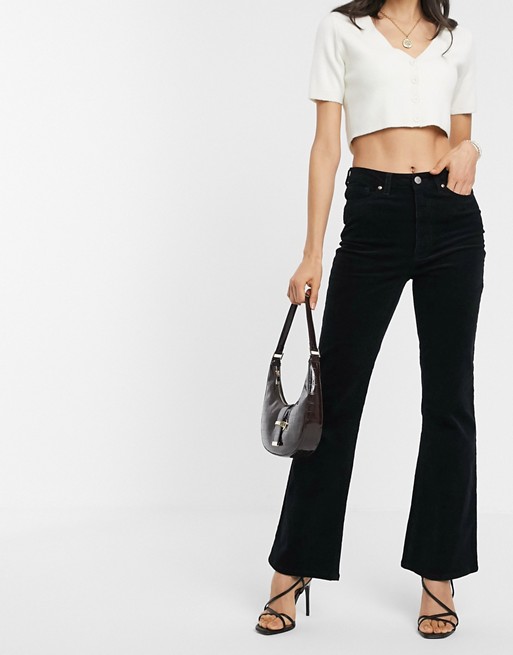Warehouse corduroy flared trousers in black