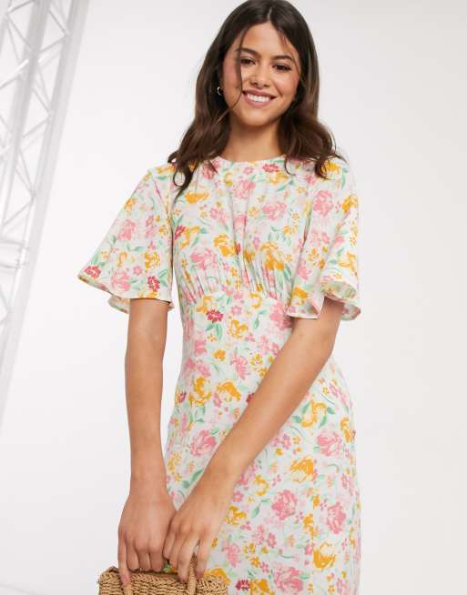 Warehouse floral print angel sleeve dress in white ASOS