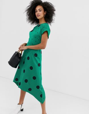 green and black spot dress