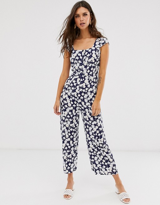 Warehouse jumpsuit with cap sleeves in navy daisy print