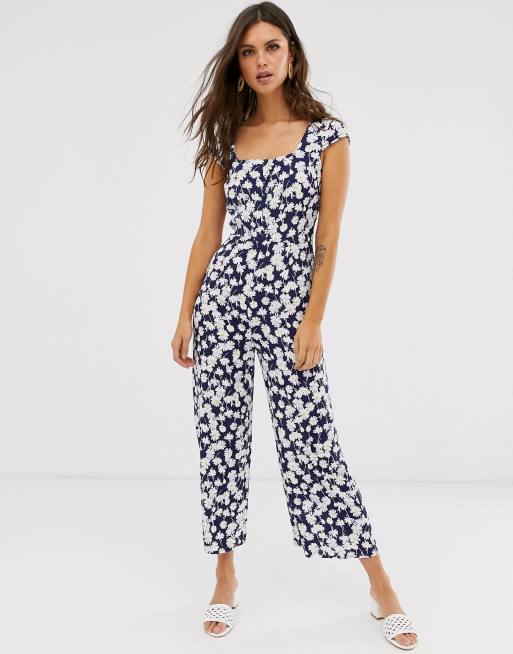 Warehouse jumpsuit with cap sleeves in navy daisy print | ASOS