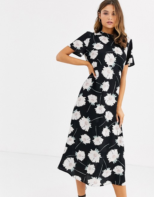 Warehouse swing dress with high neck in floral print