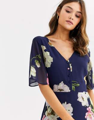 navy floral high neck print jumpsuit with tie front