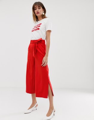 red cropped trousers