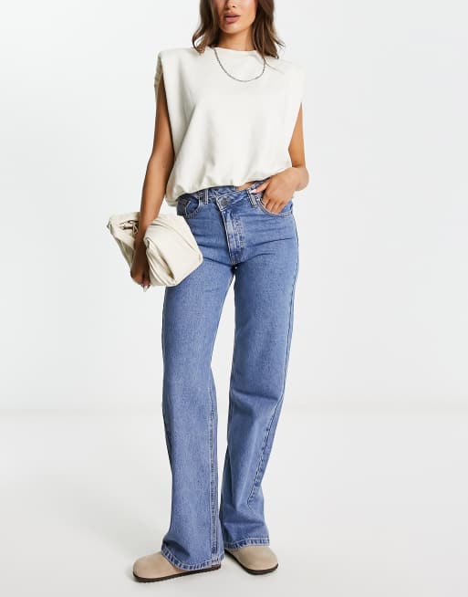 Waven - Blå jeans med vidde og asymmetrisk talje