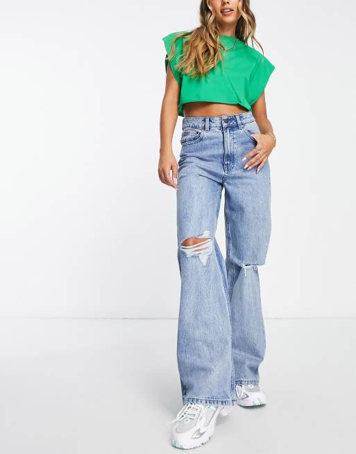 Wåven – Blekt stentvättade jeans med vida ben och revor på knäna 