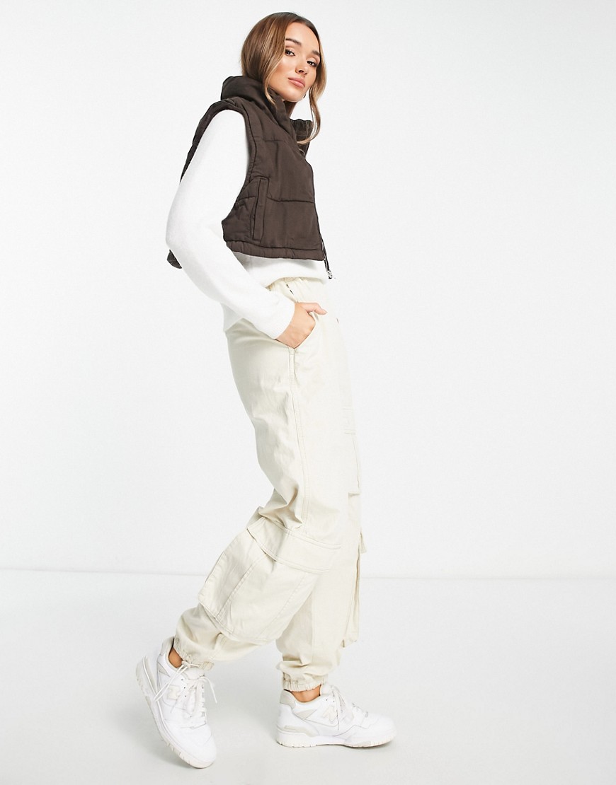 Waven cropped padded high neck vest in brown