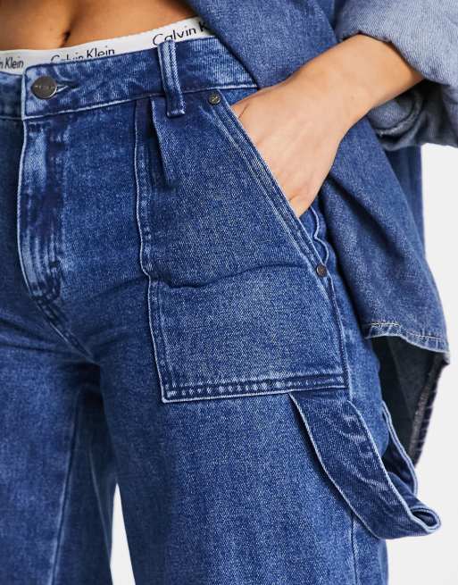 Waven wide leg cargo jeans with pocket details in washed indigo