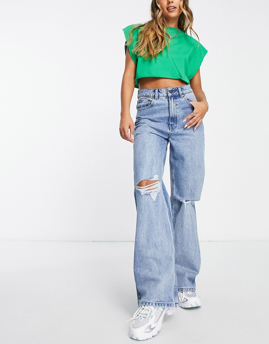 Waven wide leg jeans with knee rip in faded stone wash-Blue