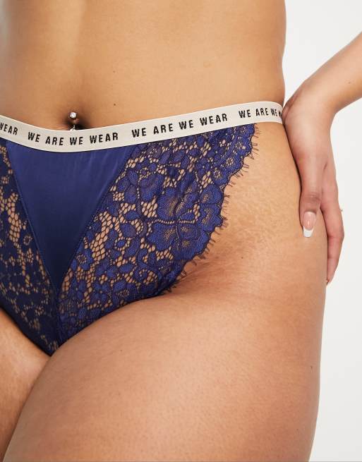 We Are We Wear Curve lace trim satin high leg tanga Brazilian briefs with logo waistband in navy