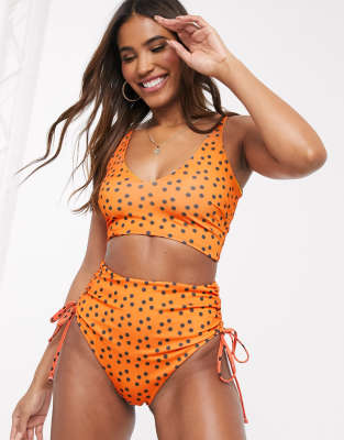 We Are We Wear mix and match recycled high waist ruched bikini bottom in orange polka dot