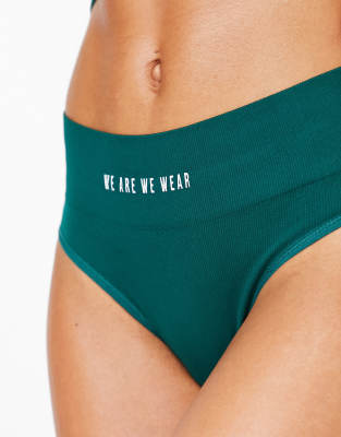 We Are We Wear nylon blend seamless high waist thong with logo detail in green - MGREEN