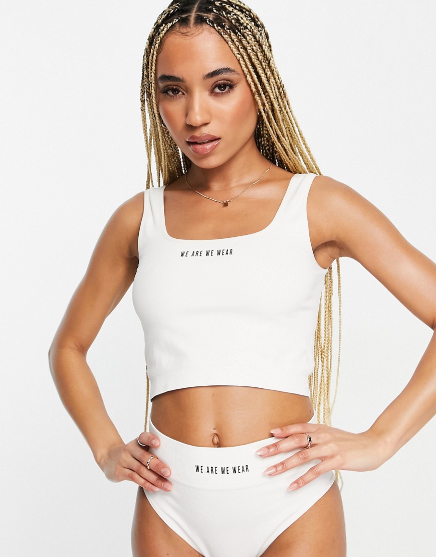 We Are We Wear nylon blend seamless square neck crop cami bralette with logo detail in cream - CREAM