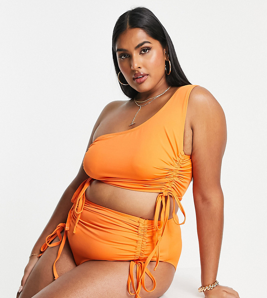 We Are We Wear Plus one shoulder bikini top with ruching in coral-Orange