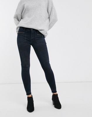 We The Free by Free People Ivy mid rise skinny jeans in black | ASOS