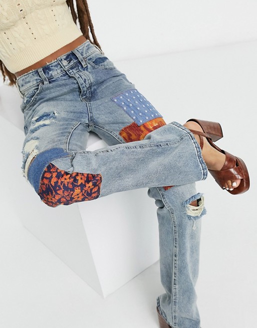 We The Free by Free People patchwork flared jeans in mid wash blue