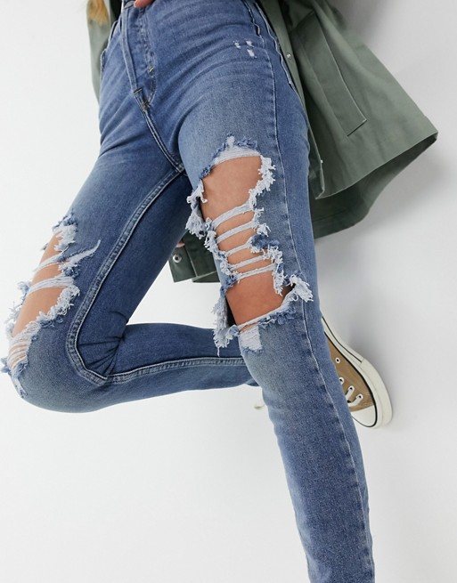 We The Free by Free People ripped skinny jeans in blue