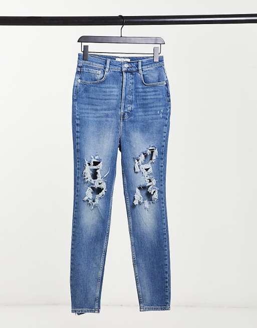 We The Free by Free People ripped skinny jeans in blue | ASOS