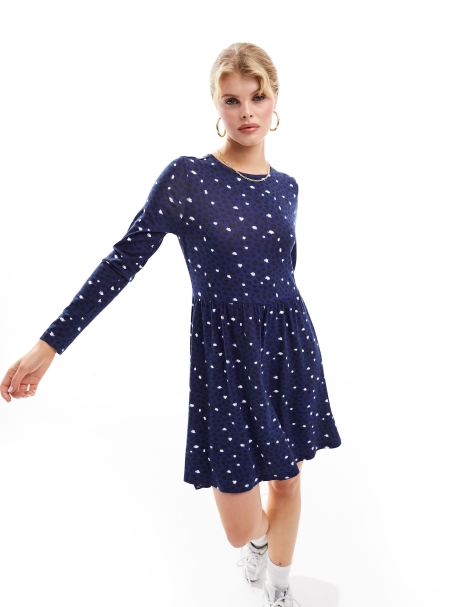 Wednesday's Girl - Aangerimpelde mini jurk met vlekkerige stippenprint in diepblauw - view 1