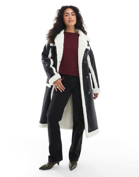 Wednesday's Girl belted faux shearling midaxi coat in black and cream - view 1
