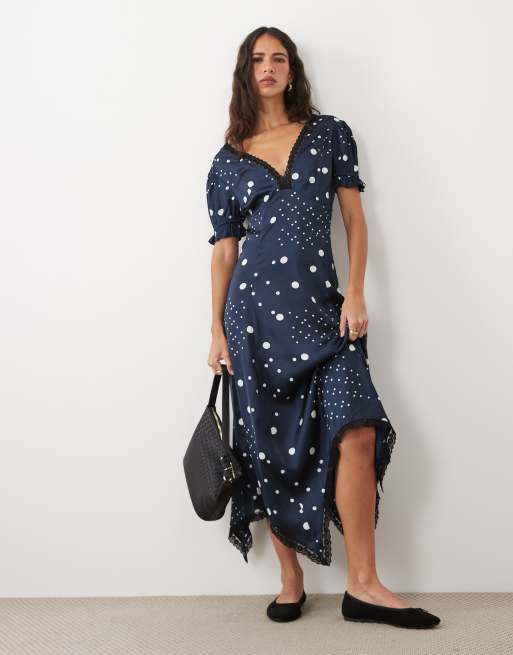 Wednesday's Girl cap sleeve satin midaxi dress with lace trim in navy polka dot