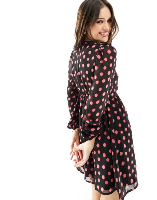 Wednesday s Girl corsage detail polka dot mini dress in black and pink ASOS