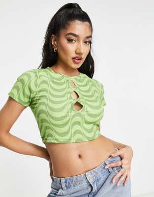 Wednesday's Girl crop t-shirt with cut out detail in green wavy print