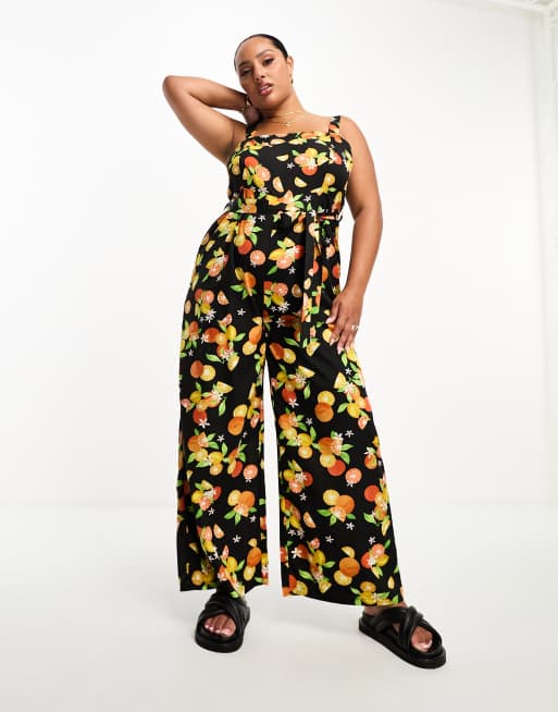 Wednesday's Girl Curve - Jumpsuit met wijde pijpen en fruitprint in zwart