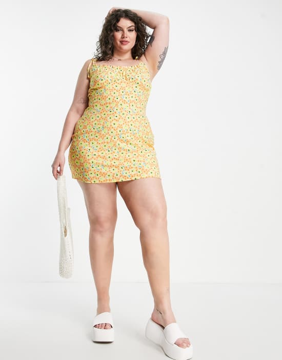 https://images.asos-media.com/products/wednesdays-girl-curve-tie-strap-ruched-bust-cami-dress-in-peach-spring-floral/202510811-4?$n_550w$&wid=550&fit=constrain