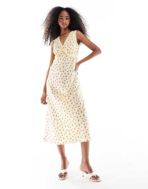 Wednesday's Girl ditsy floral v-neck midi dress in yellow - view 1