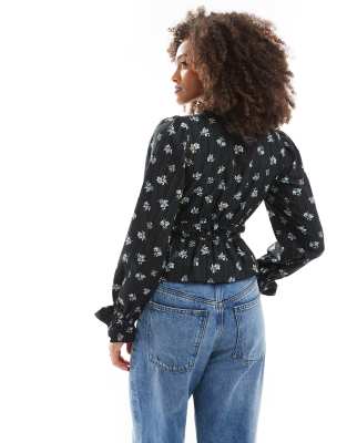 Wednesday's Girl ditsy print plisse blouse in black