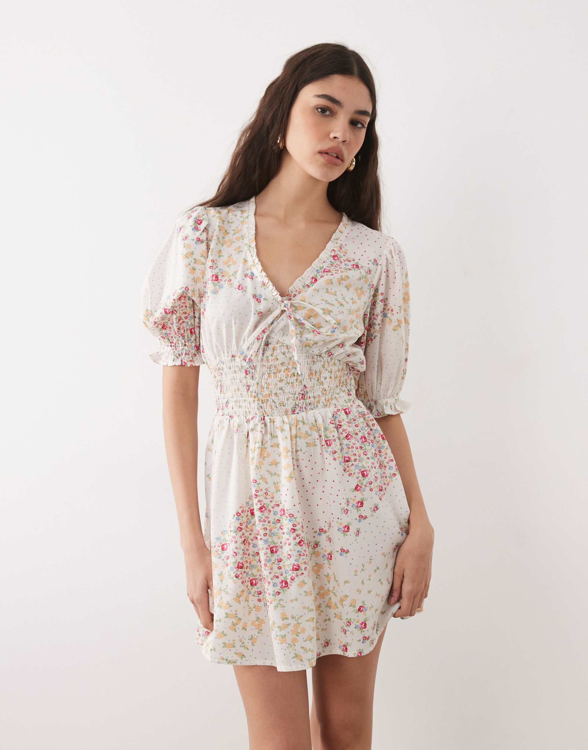 wednesday's girl floaty mini dress in beige spliced floral and polka-dot prints