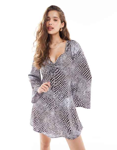 Wednesday's Girl fluted sleeve mini dress in blue snake - view 1