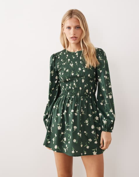 Wednesday's Girl - Gesmokte mini jurk met lange mouwen en bloemenprint in groen - view 1