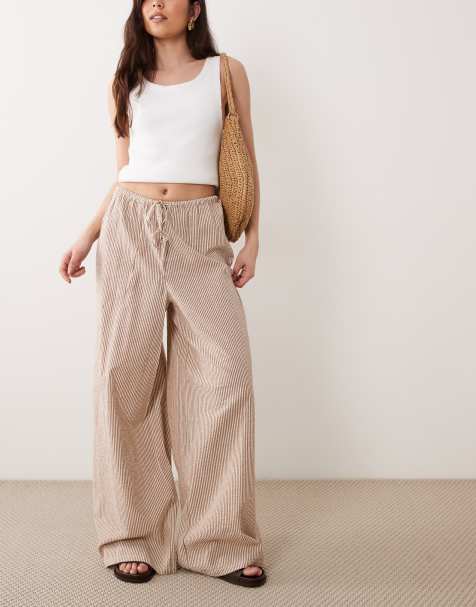 Wednesday's Girl - Gestreepte broek met wijde pijpen en strik in bruin - view 1