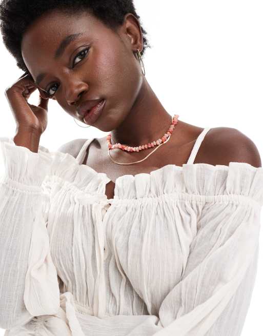 Wednesday's Girl linen smocked beach playsuit in ivory, 2 of 4