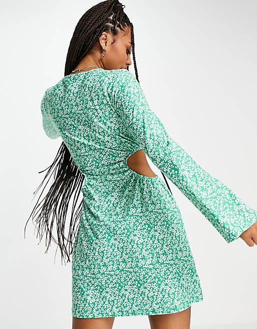 Women Wednesday's Girl long sleeve mini dress with cut outs in green ditsy 