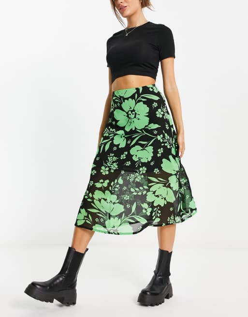 Wednesday's Girl - Midirok met doorschijnende bovenlaag in groen met zwarte bloesemprint