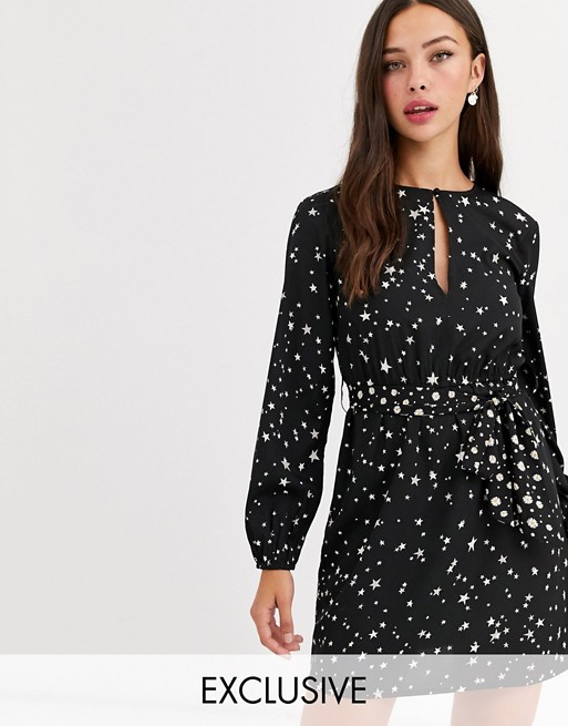Wednesday's Girl mini wrap dress in star floral mixed print