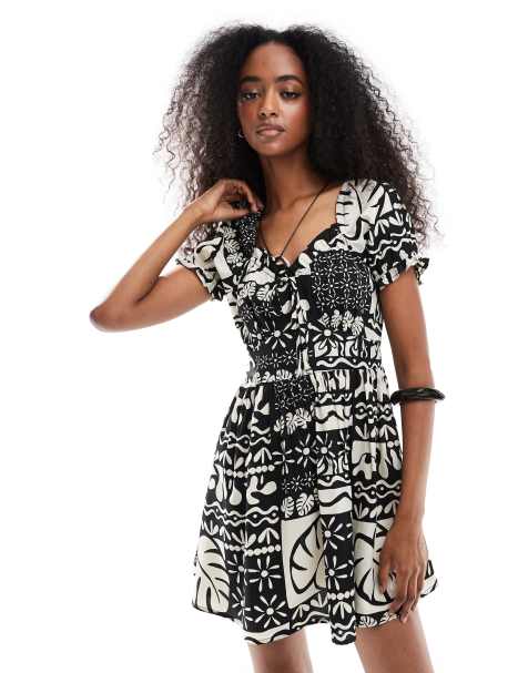 Wednesday's Girl puff sleeve printed mini smock dress in black - view 1