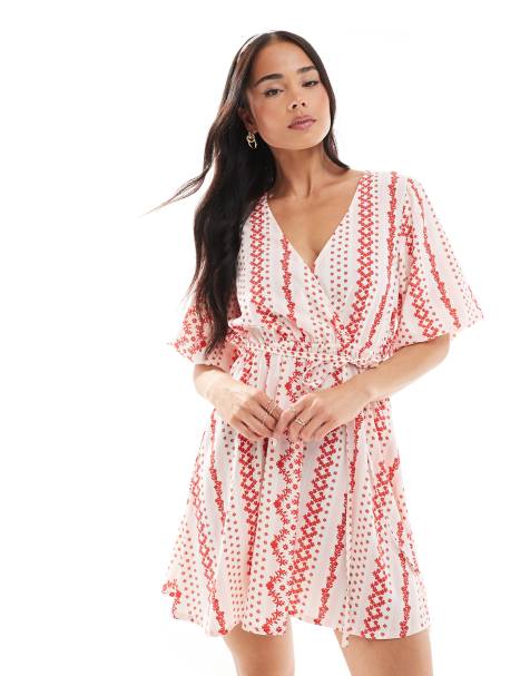 Wednesday's Girl – Rosa miniklänning med omlottdesign och randigt mönster - view 1