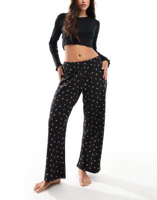 rose print pants and pointelle top pajama set in black