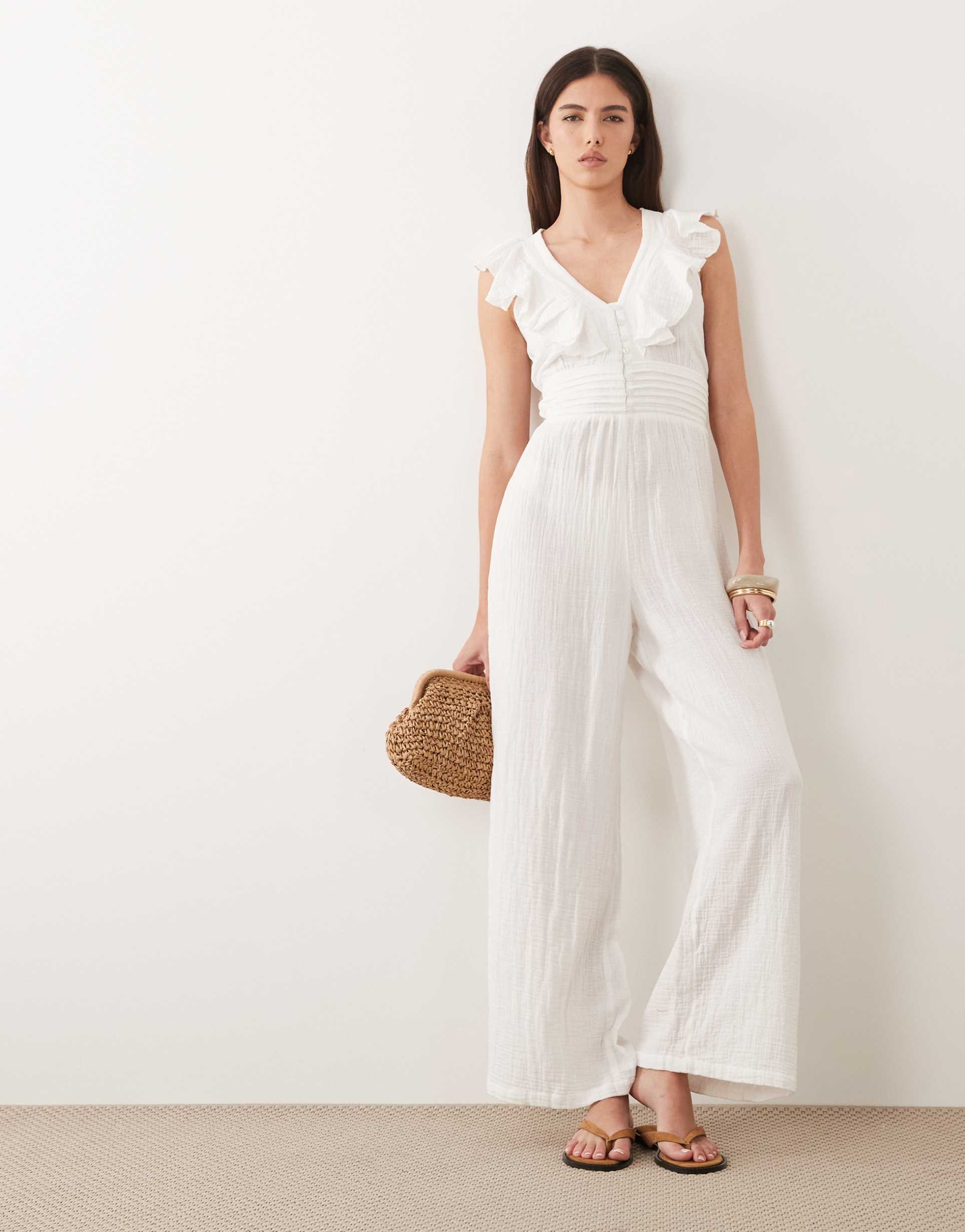 wednesday's girl ruffle edged jumpsuit in white