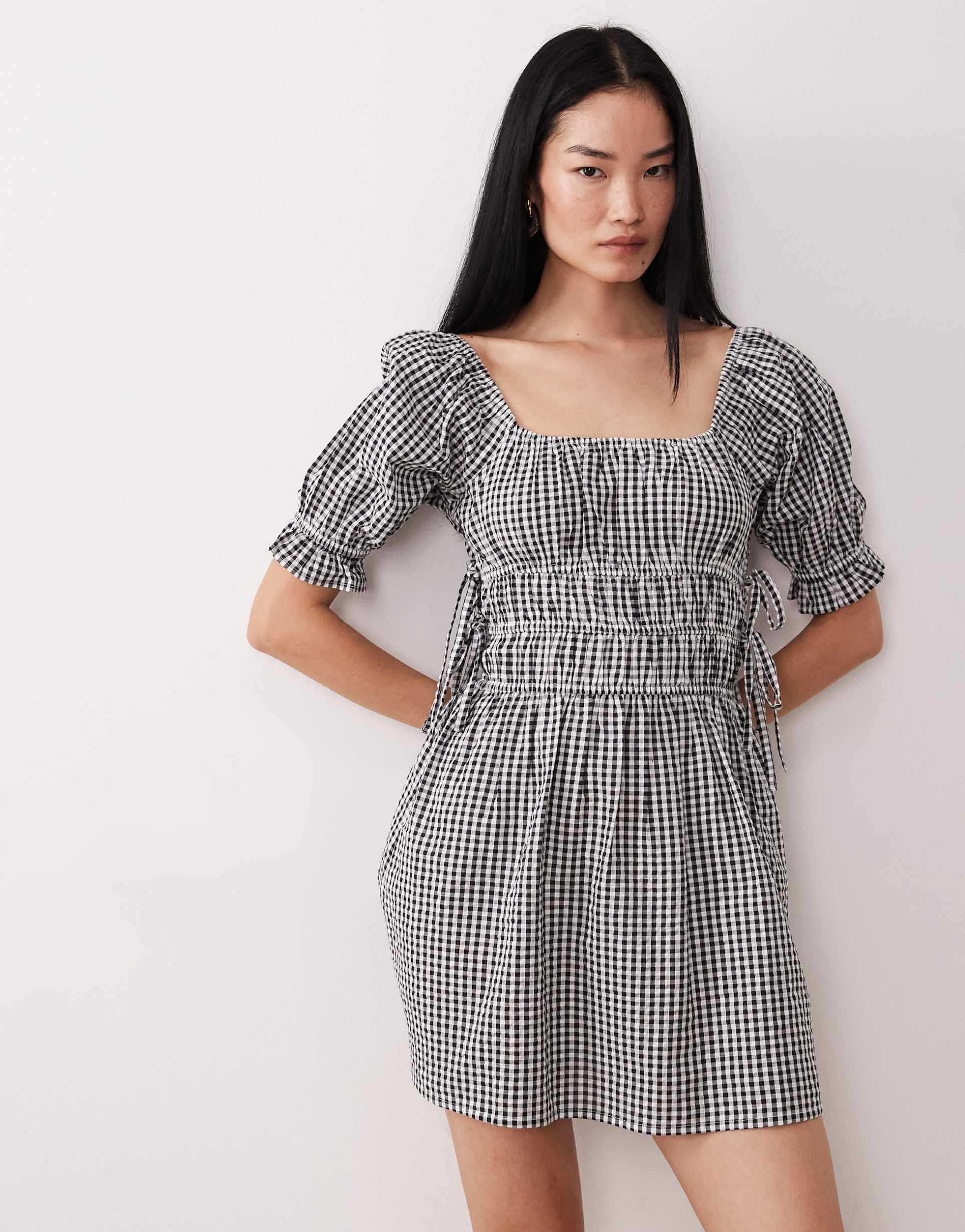 wednesday's girl seersucker milkmaid mini dress in black gingham