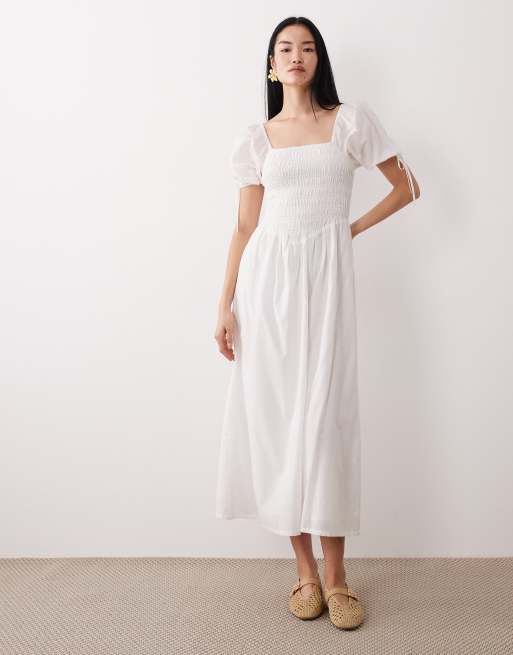 knee length dresses for ladies The Evette White Smocked Midi Dress - All Dresses main image 1