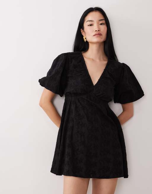 Wednesday's Girl short sleeve broderie mini dress in black | ASOS