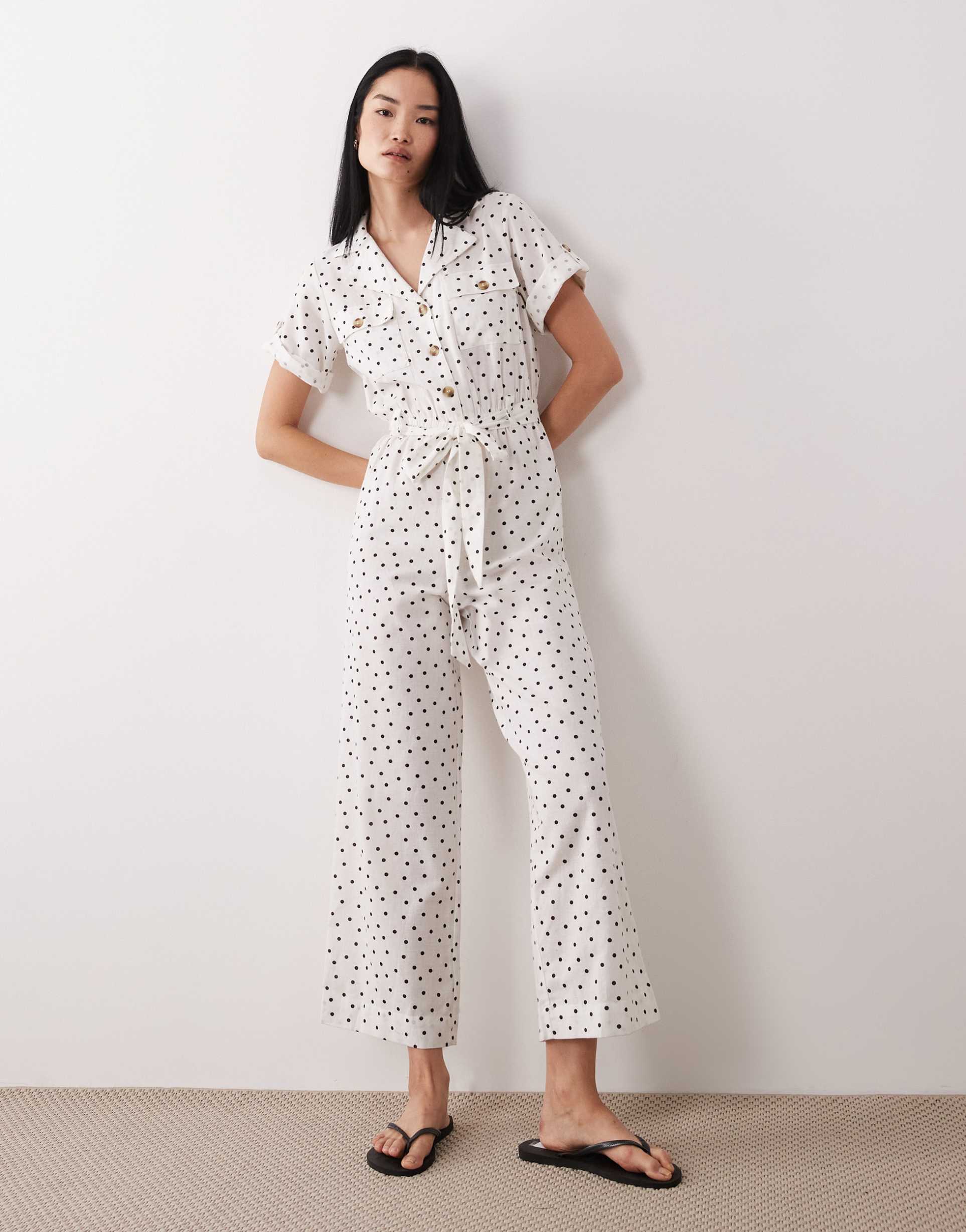 wednesday's girl short sleeve collared jumpsuit in white polka dots