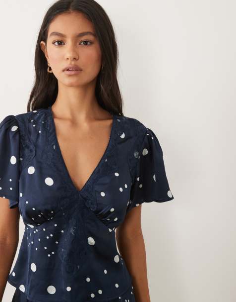 Wednesday's Girl short sleeve satin top with lace trim in navy polka dot - view 1