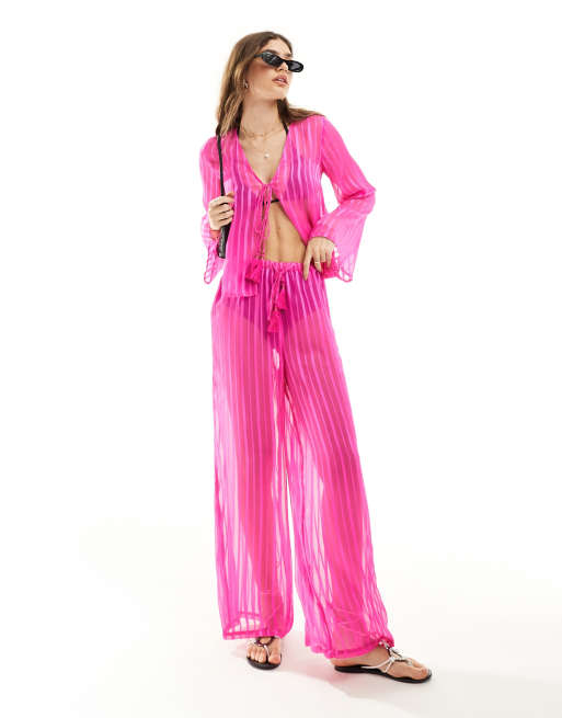 Wednesday's Girl - Strandbroek met wijde pijpen en strikdetail in felroze, deel van co-ord set